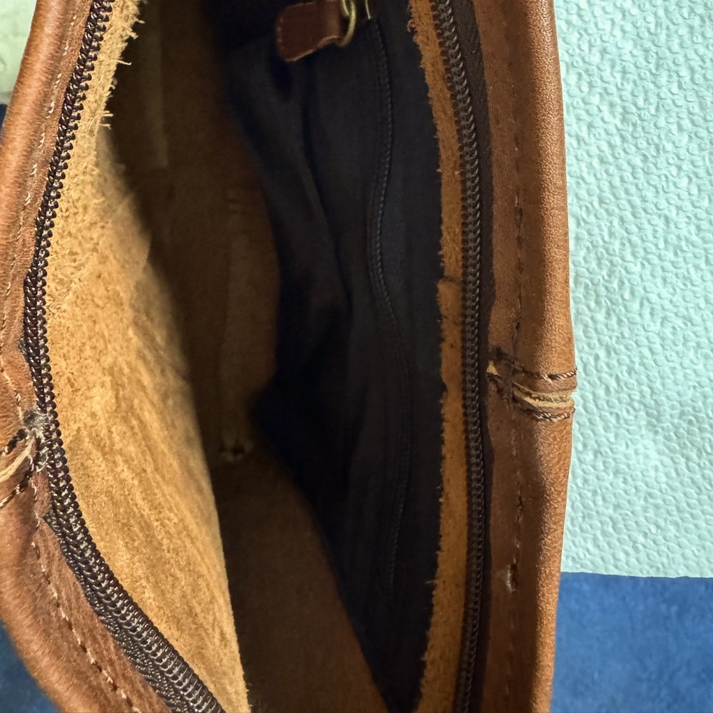 Duluth trading Company, cowhide leather brown cross body bag .